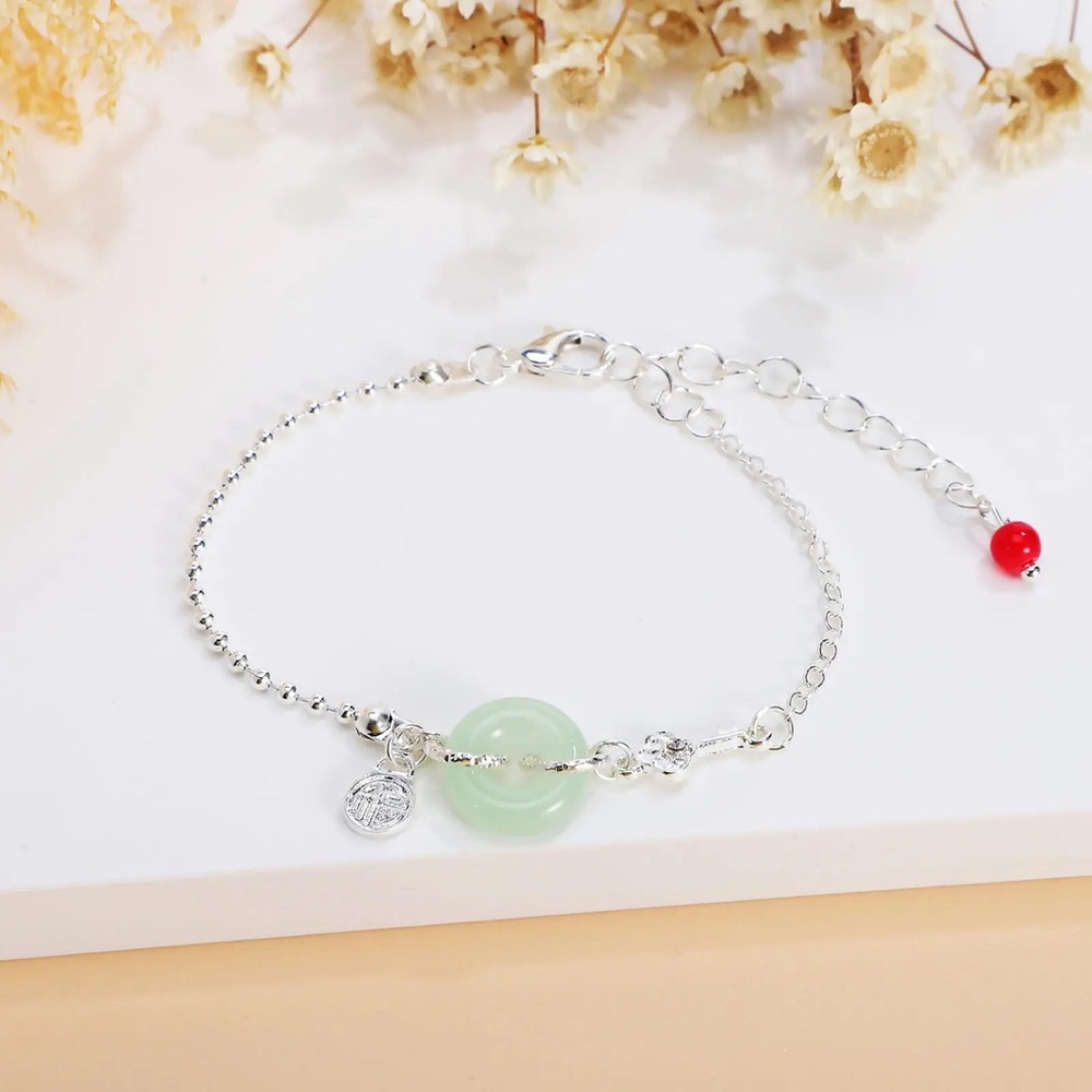 2 Silver colored Bracelet with Light Green Jade Disc and Charm